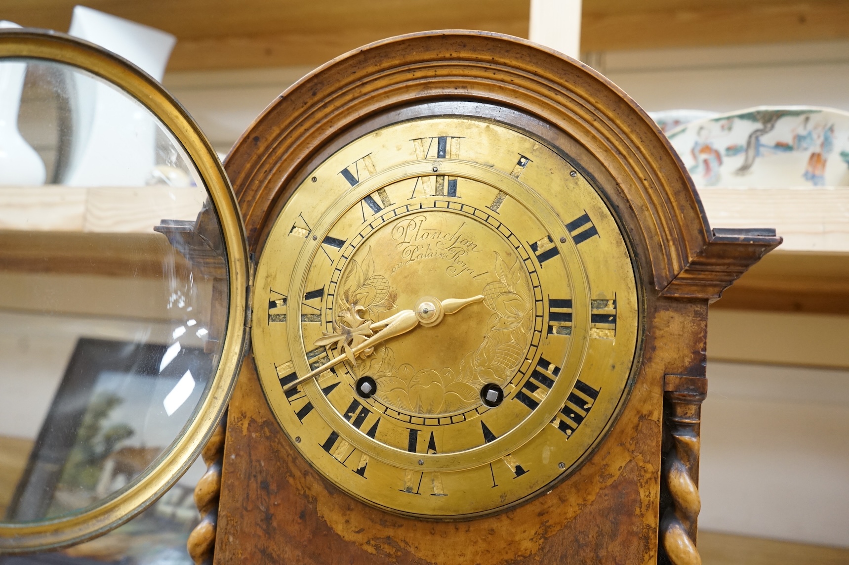 A 19th century French walnut bracket clock, the engraved brass dial signed Planchson Palais Royale, 20in.